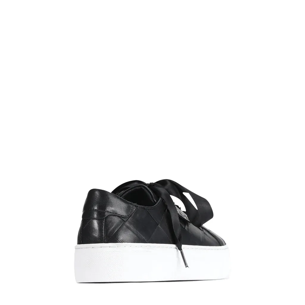 EOS Gewebte Schwarze Lederschuhe_Eos